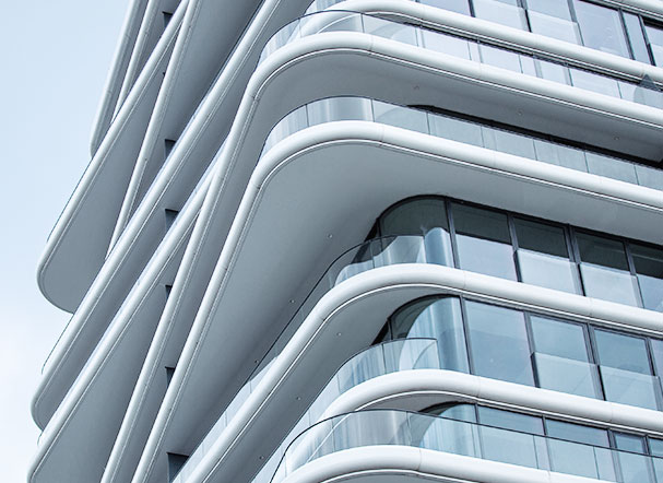 Bottom view of a building with mirrored architecture